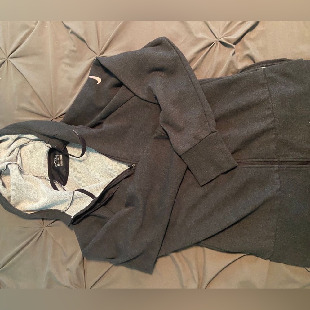 Nike Dri Fit zip up jacket. Condition is like new. Size small.
